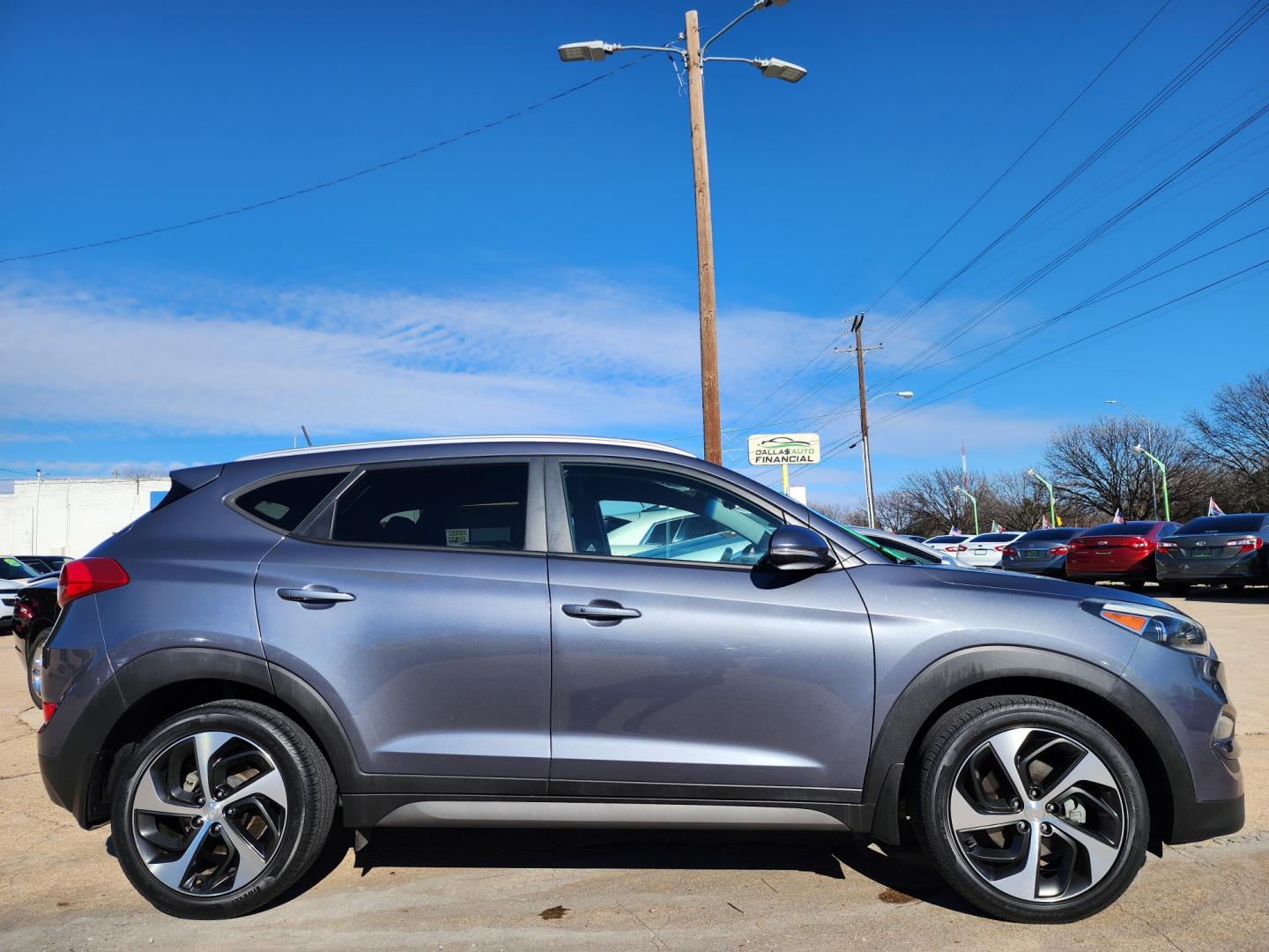 2016 BLACK Hyundai Tucson Sport (KM8J33A21GU) with an 1.6L L4 DOHC 16V engine, 7A transmission, located at 2660 S.Garland Avenue, Garland, TX, 75041, (469) 298-3118, 32.885551, -96.655602 - Welcome to DallasAutos4Less, one of the Premier BUY HERE PAY HERE Dealers in the North Dallas Area. We specialize in financing to people with NO CREDIT or BAD CREDIT. We need proof of income, proof of residence, and a ID. Come buy your new car from us today!! This is a Very clean 2016 HYUNDAI TUC - Photo#2